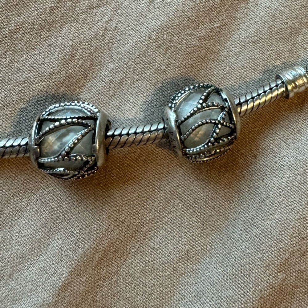Two silver Pandora beads